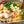 Load image into Gallery viewer, 国産牛の最高クラスの大粒トロホルモンを使用した牛もつ鍋2種セット、選べるスープで4~6人前、具材が豊富で色鮮やかな料理の画像。
