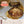 Load image into Gallery viewer, ジューシーな牛たんハンバーグがフライパンで焼かれている様子。美味しそうな焼き色が付いており、肉汁が溢れ出ている。調理時間は約10分で、家庭で簡単に再現できる味わい。
