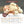 Load image into Gallery viewer, 国産牛ホルモン小腸の300gパック。新鮮で柔らかい肉質が特徴で、焼肉や煮込み料理に最適。パッケージは白と赤のデザインで、ブランド名が目立つ。
