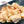 Load image into Gallery viewer, 国産牛ホルモン小腸300gの盛り付け写真。新鮮で柔らかい食感が特徴で、旨味と脂が溶け込んだ美味しい一品。
