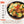 Load image into Gallery viewer, 大トロホルモン焼き（塩味・みそ味・醤油味・スタミナ味）と色とりどりの野菜が盛り付けられたプレート。ホルモンの香ばしさと野菜の新鮮さが楽しめる一品。

