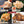 Load image into Gallery viewer, 大トロホルモン焼きの塩味、みそ味、醤油味、スタミナ味の4種類が盛り付けられた画像。色とりどりの味付けが特徴。
