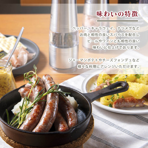 焼肉セットの画像。ジューシーなソーセージが黒いフライパンに盛り付けられ、周りにはビールやサラダが並ぶBBQスタイルの食卓。